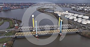 The Kattwyk Bridges are two lift bridges in the Port of Hamburg over the Southern Elbe. Birds eye aerial drone ivew.