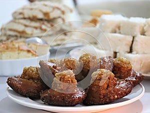 Kavum (Konda Kavum) is a sweet food often eaten in Sri Lanka. It may also be known as \'oil cakes\'.