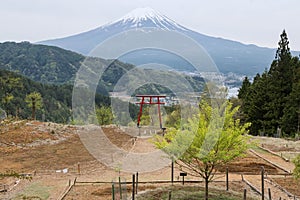 Kawaguchi Asama Shrine with red torii gate and Mt.Fuji