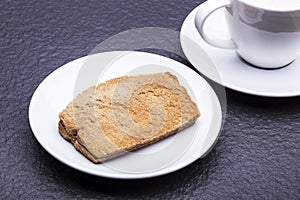 Kaya Toast (Asia Snack) on the white dish and table.