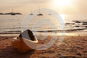 Kayak boat on sandy beach