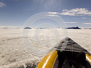 Kayak on fast ice, Gustaf Sound, Antarctica