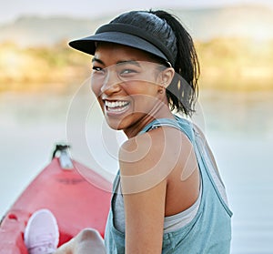 Kayak, nature and happy black woman relax on the water, boat and outdoor. Portrait of a person from New York smile on a