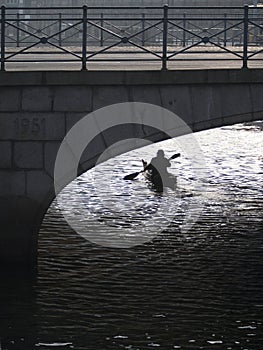 Kayak paddler on Copenhagen canal