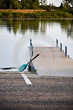 Kayak Paddles Leaning on a Dock