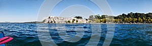 Kayak point of view of view of beautiful and picturesque village of Anguillara Sabazia located on the shores of Lake Bracciano