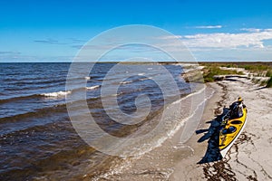 Kayak rests on the beach