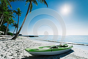 Kayak on sand beach at ocean coast