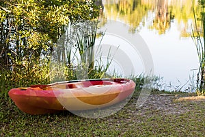 Kayak on shore near water