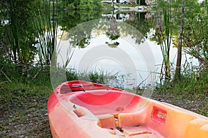 Kayak on shore near water