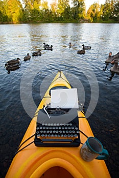 Kayak with a typewriter