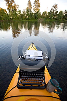 Kayak with a typewriter