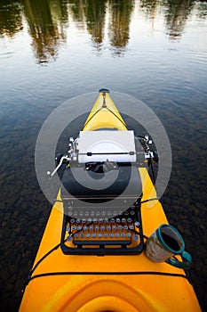 Kayak with a typewriter