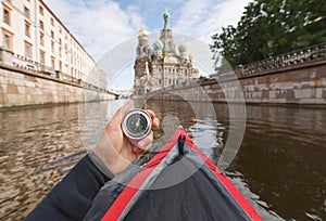 Kayaker with compass in Saint-Petersburg, Russia.