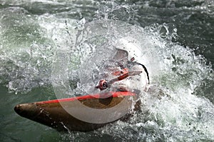 kayaker maneuvering