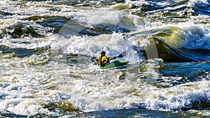 Kayaker navigating through the White Waters of the Thompson River