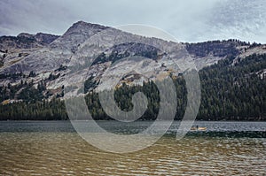 Kayaker paddling on Tenaya Lake, Yosemite National Park