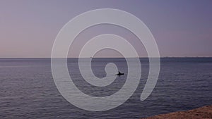 Kayaker rowing in the adriatic sea