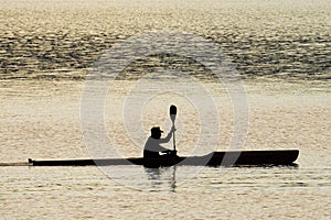 Kayaker silhouette.