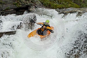 Kayaker in the waterfall