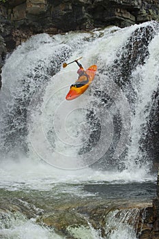 Kayaker in the waterfall