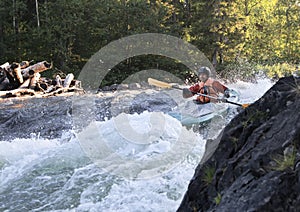 Kayaker in whitewater