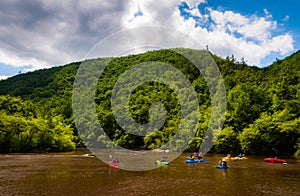Kayakers in the Lehigh River, located in the Pocono Mountains of