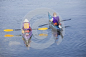 Kayakers paddling