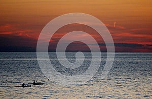 Kayakers at Sunset