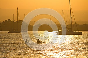 Kayakers at sunset