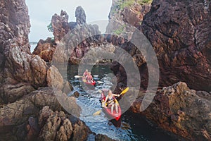 Kayaking, adventure travel, group of people on kayaks photo