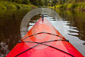 Kayaking, canoeing on the river in the middle of the summer.