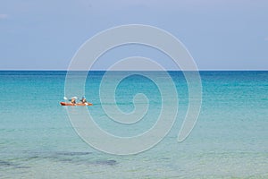 Kayaking in the clear crystal sea near koh Kood Island, Thailand Gulf of Siam