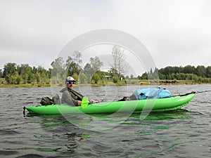 Kayaking down the river, Sayan mountains, Siberia