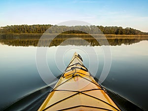 Kayaking on glassy water