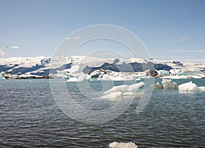 kayaking in Iceland next to glacier iceberg