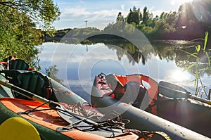 Kayaking on the riverbank. Canoeing. Active recreation on the water