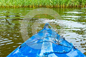 Kayaking by wild river in poland (Omulew river)