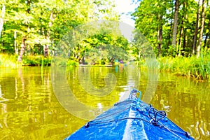 Kayaking by wild river in poland (Omulew river)