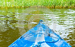 Kayaking by wild river in poland (Omulew river)