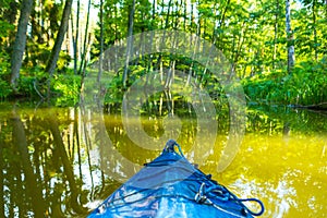 Kayaking by wild river in poland (Omulew river)