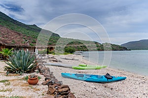 Kayaks on a Beach in Baja California Sur, Mexico photo