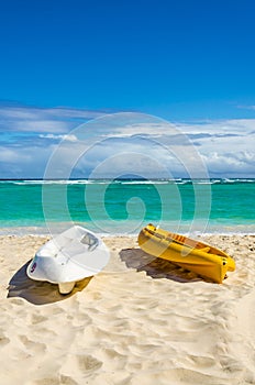 Kayaks on the beautiful sandy Caribbean beach photo