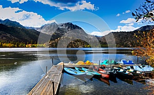 Kayaks and boats in Gull lake, Sierra mountains