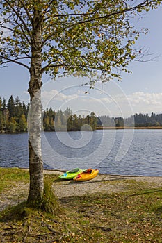 Kayaks at lake shore kirchsee