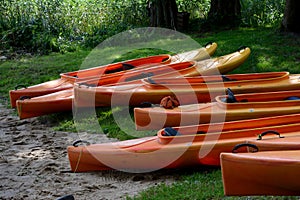 Kayaks on lake shore