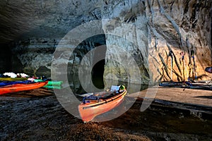 Kayaks lined up at an abandoned underground silica mine that is flooded with water at Crystal City, Missouri.