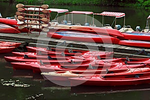 Kayaks rent point. The red boats on pier