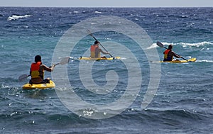 Kayaks at sea