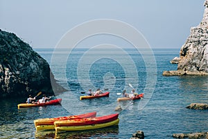 Kayaks at sea. Tourist kayaking in the sea near Dubrovnik, Croat